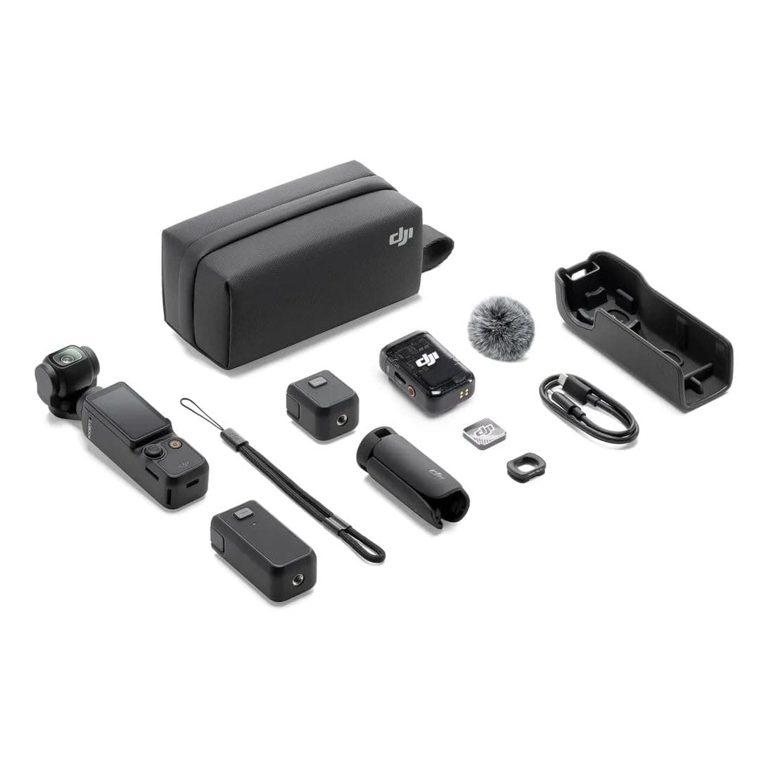 Various action cameras and a wireless microphone system on a white surface, ready for snow recording.